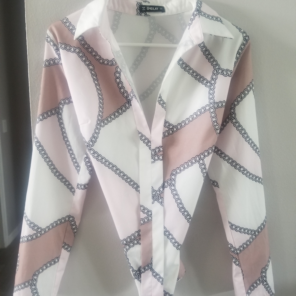Ladies blouse. Ready to get back to the office? Beautift and light pink blouse